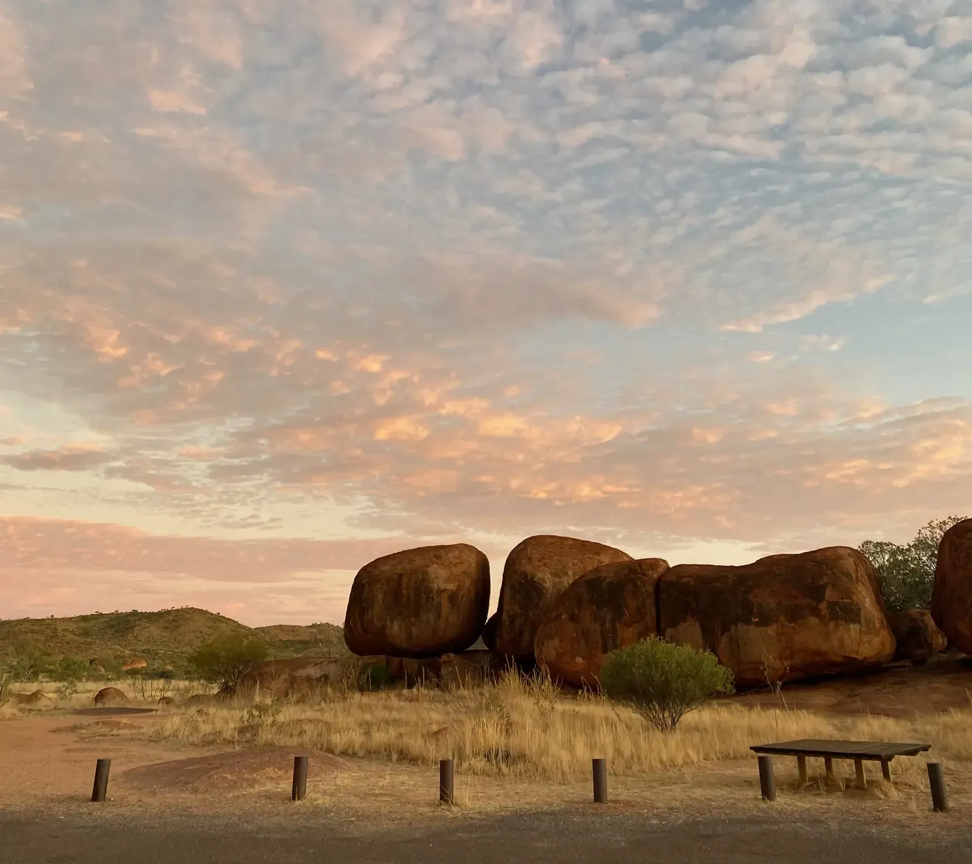 Devils Marbles, granite boulders under a clouded sky